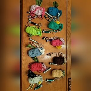 Handmade crochet doggy poop bag holders with little flashlight and more